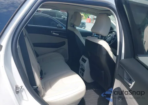 2022 Ford Edge Titanium z USA, uszkodzony, nr VIN 2FMPK4K90NBA13263